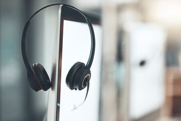 Poster - Call center, headset and computer in empty office for customer service business with technology. Telemarketing job, headphones and microphone on monitor at help desk for crm, networking and support.