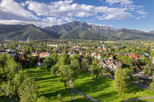 Aerial View Of Zakopane Town With Tatra Mountains Range In Summer, Poland.