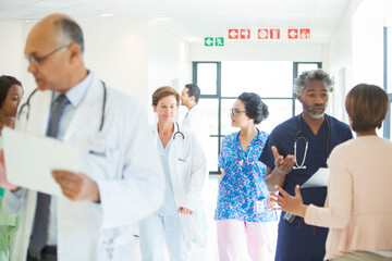 Poster - Doctors and nurses in hospital corridor