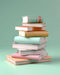 © Andreas - A stack of different books in size and color on a mint background.