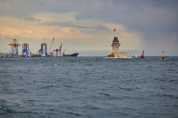 Wall Mural - Construction works in Bosphorus strait near Maiden's tower in Istanbul, Turkey