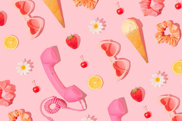 summer creative pattern made with heart sunglasses, ice cream, retro phone handset, scrunchies, stra