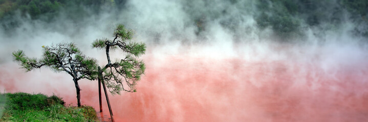 hells of beppu, red hotspring in japan panoramic header with copy space