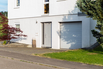 Wall Mural - garage carport on a modern house facade