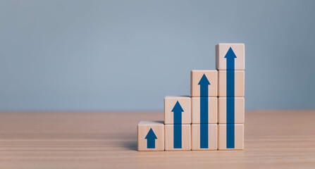 Sticker - business growth success process concept. wood block stacking as step stair with arrow up. plan growth and increase of positive indicators in his business.