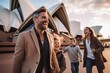 © Anne Schaum - Lifestyle portrait photography of a grinning man in his 40s that is with the family at the Sydney Opera House in Sydney Australia . Generative AI