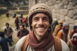 Portrait of smiling man with friends in background at Machu Picchu