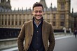 © Leon Waltz - Portrait of a handsome young man in front of Big Ben in London