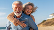 © Margo Alexa - Happy active senior couple having fun outdoors. Portrait of an elderly couple together .Generative A  Generative AI