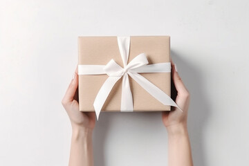 Woman hands holding a neutral color giftbox with white ribbon. Generative AI