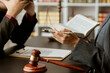 Attorneys or lawyers who are reading the statute of limitations Consultation between male lawyers and business clients, tax and legal and legal services