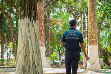 Unknown Policeman Or Security Guard In The Park In The City Of Limon. In Costarica Drinking Of Alcohol In Parks Is Forbidden, Hence The Security Guards.