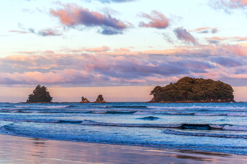 Wall Mural - Dazzling sunset over Whangamata Beach, New Zealand