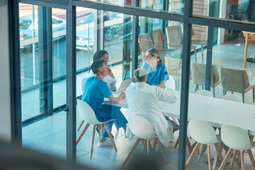 Wall Mural - healthcare, doctors and team meeting with a laptop for a discussion, planning or research at table. 