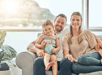 Portrait of mother, father and child on sofa in living room for bonding, quality time and relax together. Happy family, smile and mom and dad with girl for care, love and happiness at home on weekend