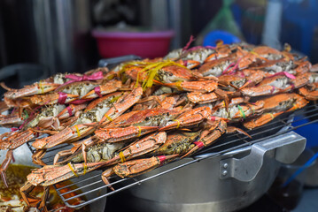 Sticker - Many seafood crabs in vietnamese night market in food festival