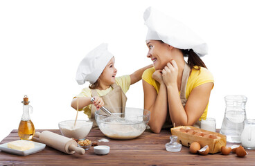 Canvas Print - The beautiful young mother and her little daughter cooking