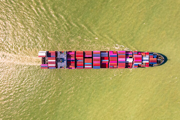 Wall Mural - Aerial top view of ship carrying container and running.