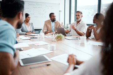 Business people, meeting and marketing strategy in team planning or sharing ideas at office. Group of employees in teamwork, collaboration or brainstorming for market plan or project at conference