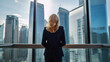 © Kingboy - A Business Woman's View of the Skyscraper City from her Office, Back view. Generative AI