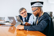 © jaimelafrickmartial  - Two serious interracial businessmen thinking about how to solve problem while corporate, preparing for important negotiation, dealing with business challenges.