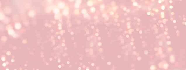 Wall Mural - festive pink christmas background with golden bokeh lights - xmas greeting card and banner
