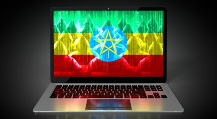 Ethiopia - country flag and hackers on laptop screen - cyber attack concept