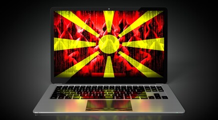 Macedonia - country flag and hackers on laptop screen - cyber attack concept