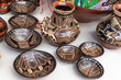 Pottery craft made by Quechua women from the Ecuadorian Amazon region, city Puyo. Small bowls and jug with a traditional design for everyday use and for communal ritual activities.