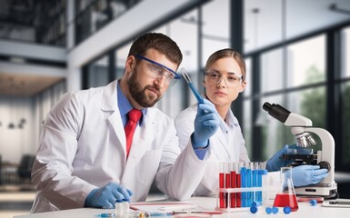 Wall Mural - Young scientists research in a medical laboratory