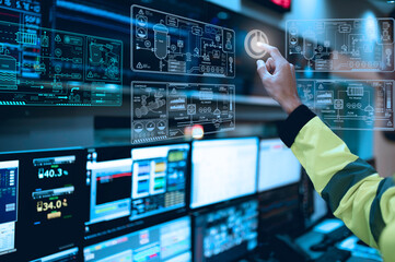 Engineer working at control room,Manager control system,Technician man monitoring program from a lot of monitor