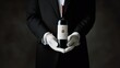 Elegance personified: a butler gracefully holding a wine bottle