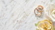 Wedding rings and roses on a white marble background, flat lay, top-down view. Wedding bands banner, website header, wedding invitation. Generative AI.