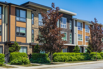 Wall Mural - New Modern Apartment Buildings in Vancouver BC. Canadian modern residential architecture on sunny summer day