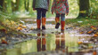 Leinwandbild Motiv The children are walking in the puddles. Generative AI