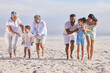 © Alexis Scholtz/peopleimages.com - Big family, grandparents or happy kids walking on beach to relax with siblings on fun holiday together. Dad, mom or children love bonding, smiling or playing with senior grandmother or grandfather