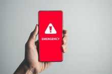 Emergency call and alert icon on red mobile screen for emergency accident hot line 911 concept.
