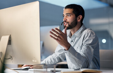 Poster - Call center, man and talking at computer for customer service, telemarketing sales and CRM consulting at night. Male agent, desktop pc and communication for advice, questions and technical support