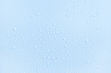 Drops On A Pastel Blue Background