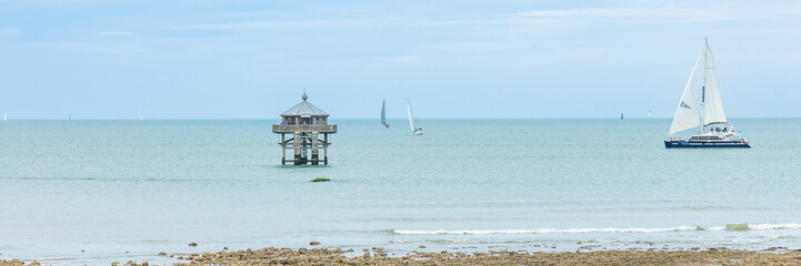 Wall Mural - The Phare du Bout du Monde, a wooden lighthouse at the Pointe des Minimes in La Rochelle, France