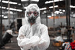 © SpaceOak - Industrial waste inspector wearing personal protective equipment to check hazardous chemicals, radioactive and toxic substances. Analyzing impact of factory's current projects, suggesting solutions.