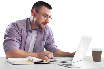 Happy cheerful businessman working on a laptop in office.