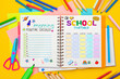 © TSViPhoto - Morning Routine Checklist, School timetable. Top view flat lay concept. Lettering written in a scrapbook, colored paper, multi-coloured letters, supplies for school