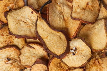 Wall Mural - dried pear, dried fruits close-up, top view.