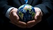 © Moritz - A businessman holds a global business globe, interconnected with a network, while focusing on digital marketing strategies and innovative solutions. Utilizing business development technology, this ind