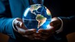 © Moritz - A businessman holds a global business globe, interconnected with a network, while focusing on digital marketing strategies and innovative solutions. Utilizing business development technology, this ind
