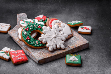 Beautiful colored Christmas gingerbread cookies for the design and decoration