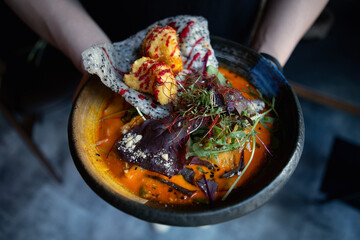 Canvas Print - Man eating healthy asian soup