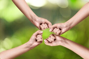 Canvas Print - teamwork concept, People join hands on background