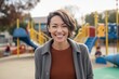 © Leon Waltz - Medium shot portrait photography of a grinning woman in her 30s that is wearing a cozy sweater against a children's playground with parents and kids background .  Generative AI